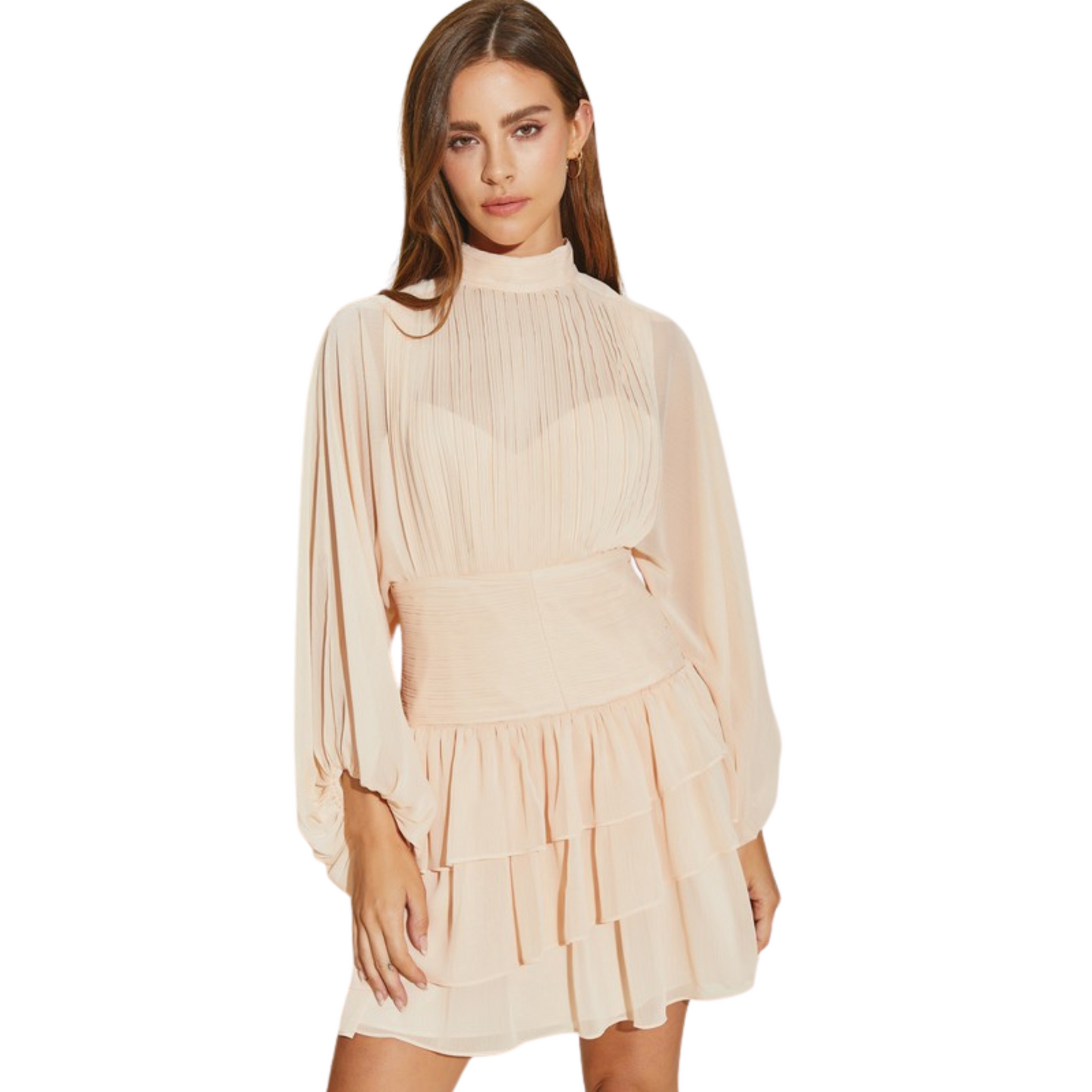 Expertly crafted, this Pleated Tiered Dress features a beautiful light blush color and long sleeves for a sophisticated look. With its tiered design, this mini dress adds a touch of elegance to any occasion. Made with quality materials, it's the perfect addition to any wardrobe.