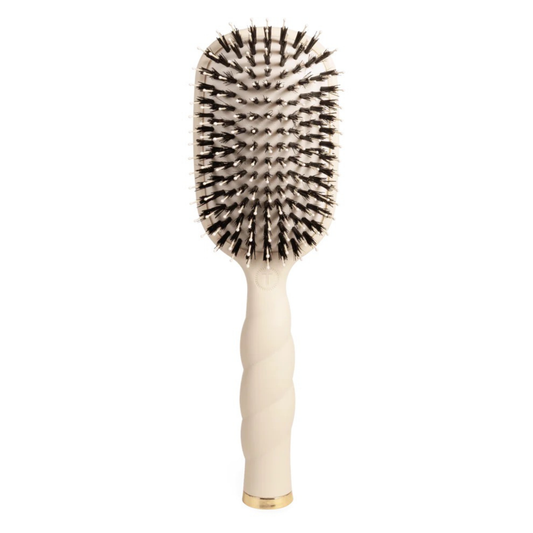 Teleties Boar Bristle Hair Brush in tan combines natural bristles with expert craftsmanship. Boar bristles gently detangle and smooth hair while distributing natural oils from scalp to ends, promoting shine and reducing frizz. The tan finish offers a warm, natural aesthetic that complements any bathroom or vanity. Perfect for daily styling, this brush works on all hair types and textures. Teleties quality ensures durability and long-lasting performance.