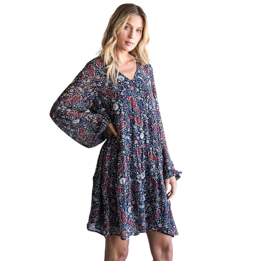 This boho abstract print dress is the perfect addition to your wardrobe. Boasting a bold paisley print, long sleeves, and a boho style, you'll be making a fashion statement everywhere you go. Get ready to turn heads and make a statement.