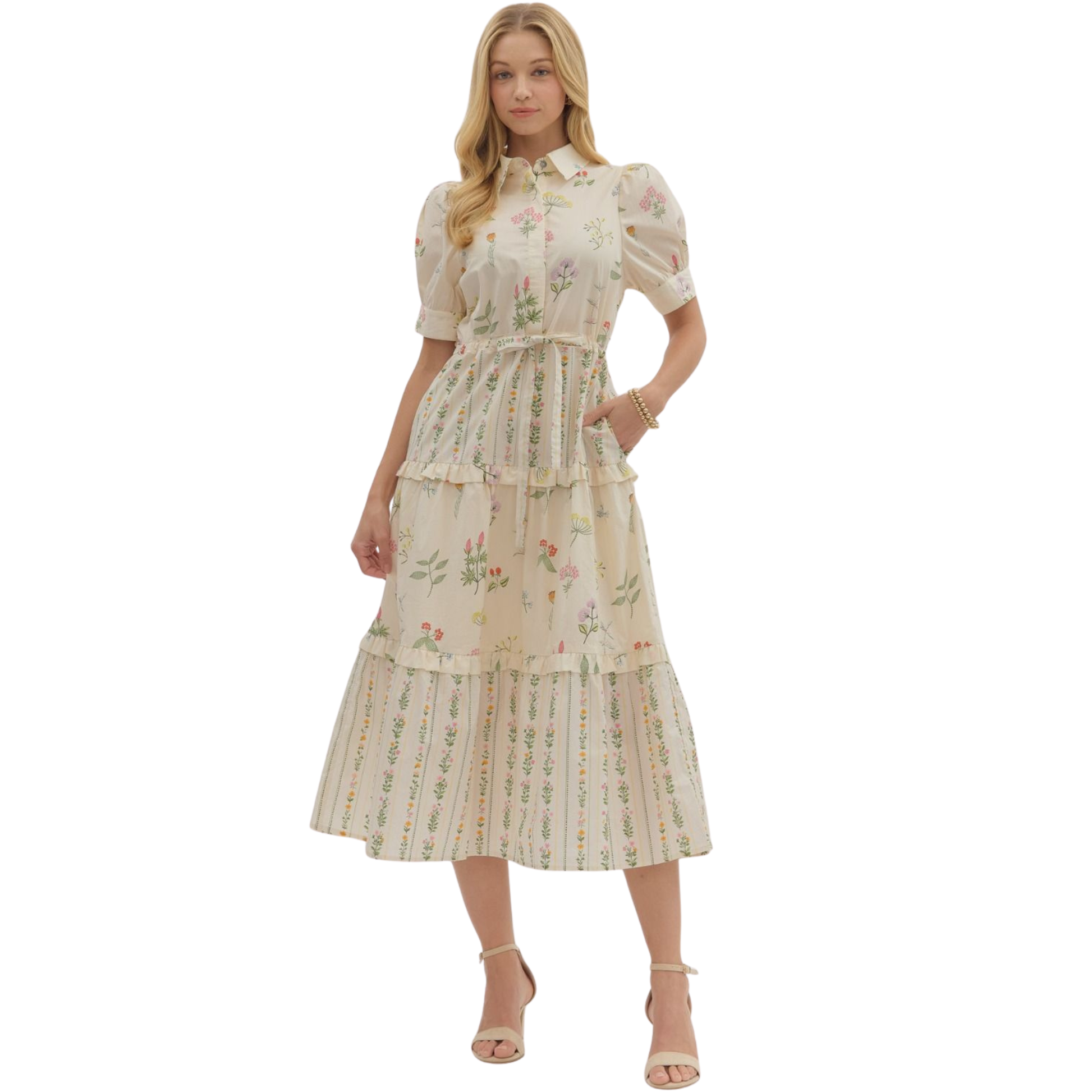 Elevate your seasonal wardrobe with this Entro botanical print midi dress, designed for effortless sophistication. The vibrant floral pattern brings natural elegance to any occasion, while the flattering midi length offers versatile styling options from casual outings to elevated events. Short sleeves provide comfortable breathability, making this piece ideal for transitional weather.