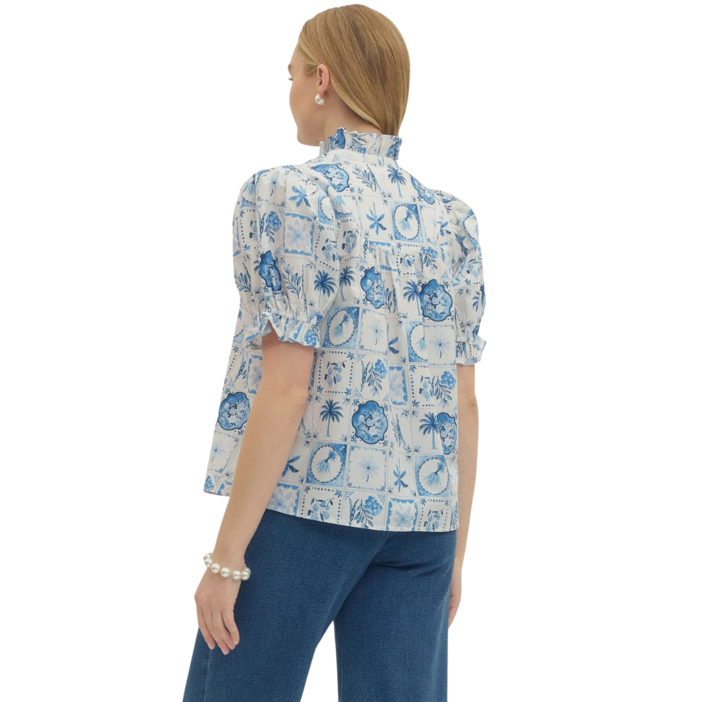 Elevate your wardrobe with this stunning Botanical Print Puff Sleeve Top by Entro. Featuring a vibrant blue botanical print that brings nature-inspired elegance to your everyday style, this top combines timeless charm with modern flair. The signature puff sleeves add a romantic, feminine touch while maintaining a flattering silhouette. Perfect for casual outings, brunch dates, or layering under your favorite jacket. 