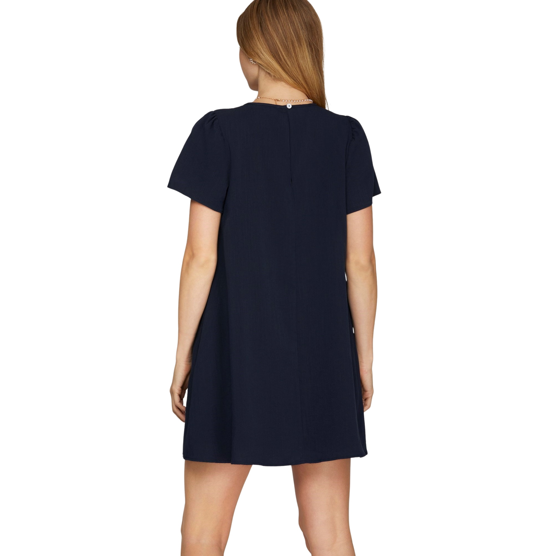 Elevate your wardrobe with this charming She+Sky mini dress, designed for effortless style. The navy woven fabric provides a classic foundation, while delicate white bow accents add a playful, feminine touch. The flattering V-neckline creates a sophisticated silhouette perfect for any occasion—from casual outings to evening events. Lightweight and versatile, this dress pairs beautifully with sneakers for a relaxed look or heels for something more polished. 