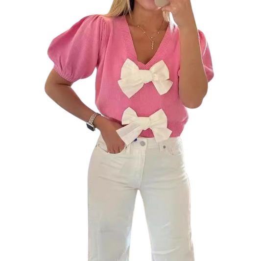 This pink V-neck sweater from Oh Sense features short sleeves and delicate bow accents, making it a stylish and versatile addition to your wardrobe. Crafted from high-quality materials, this sweater is both comfortable and elegant, perfect for any occasion.