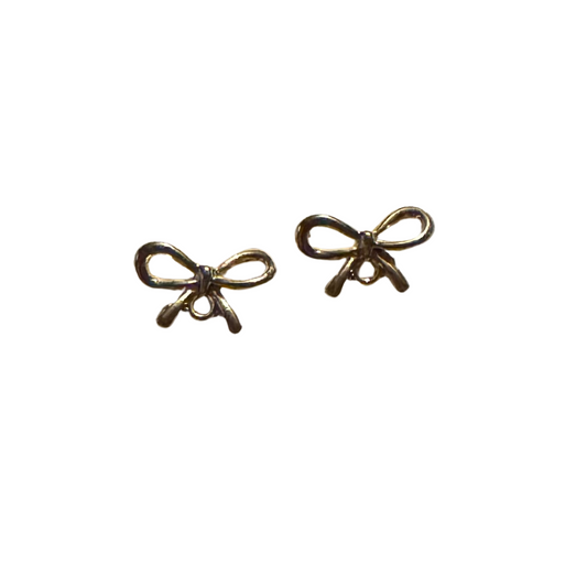 Discover elegance and sophistication with our Bowtie Studs. Crafted in gold, these stud earrings feature a unique bowtie shape for a touch of style and charm. Perfect for both casual and formal occasions, add a touch of luxury to any outfit with these stunning earrings.