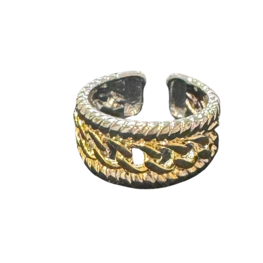 This expertly crafted braided ring features a sophisticated blend of silver and gold, creating a striking two-tone effect. Its adjustable design ensures a comfortable fit, available in sizes 6, 7, and 8. The intricate braided pattern adds texture and elegance, making it a versatile accessory for both casual and formal occasions.