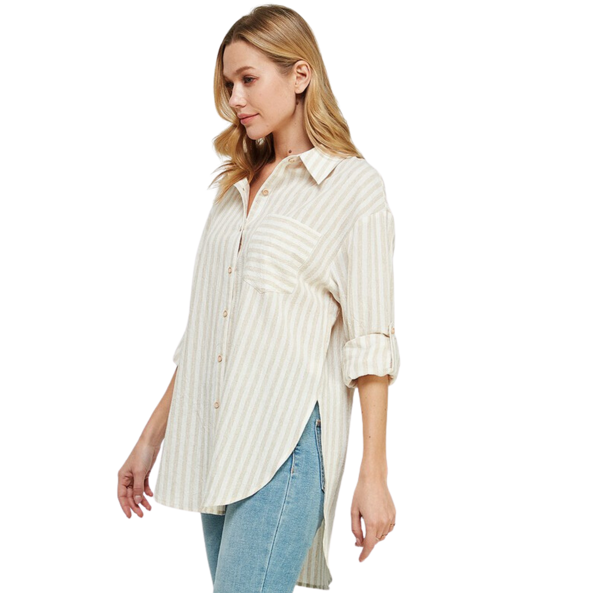 The Breezy Linen Boyfriend Shirt is the perfect mix of style and ease. Made from the best quality linen, this classic striped shirt is a stylish option for any wardrobe. The button-up design, collared neck, and contrast stripes make it a versatile piece for any occasion.