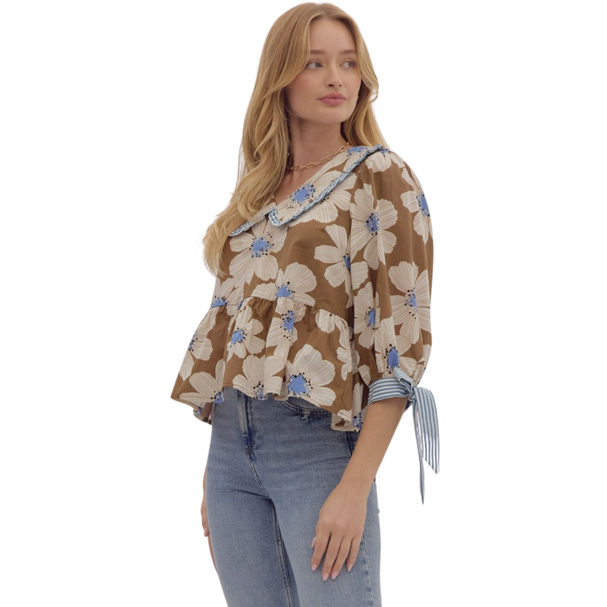 Discover playful elegance with our Floral Print Peplum Top. This relaxed fit top features a charming ruffle-edged peter pan collar and adjustable ribbon tie closure. The ¾ puff sleeves add a touch of femininity. In a beautiful brown color, this woven top is non-sheer, lightweight, and perfect for any occasion. Add a touch of romance to your wardrobe today.