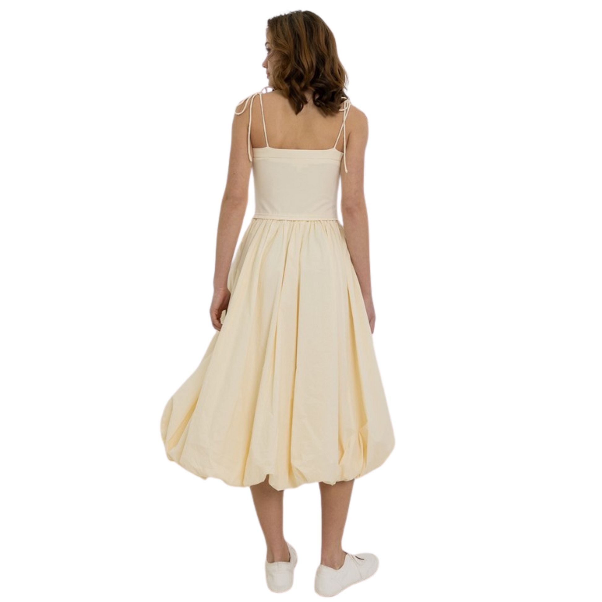 This buttermilk-colored midi dress by Heyson boasts spaghetti tie straps and a trendy bubble hem. Chic and versatile, this dress is perfect for any occasion. Made with high-quality materials, you can trust in the Heyson brand for long-lasting style.