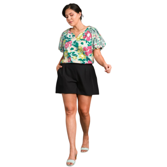 This Mixed Media Bubble Sleeve Top features a mint mix floral print and short sleeves for a flirty and whimsical look. Perfect for spring, its soft and lightweight fabric will keep you feeling comfortable all day.