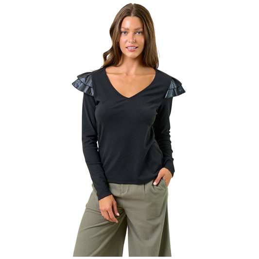 Elevate your wardrobe with the Butterfly Ruffle Top by Doe and Rae. Featuring a flattering V-neck and delicate butterfly-shaped ruffles, this long-sleeve black blouse combines elegance and subtle drama. Its refined design ensures both comfort and style, perfect for professional looks or sophisticated casual wear.