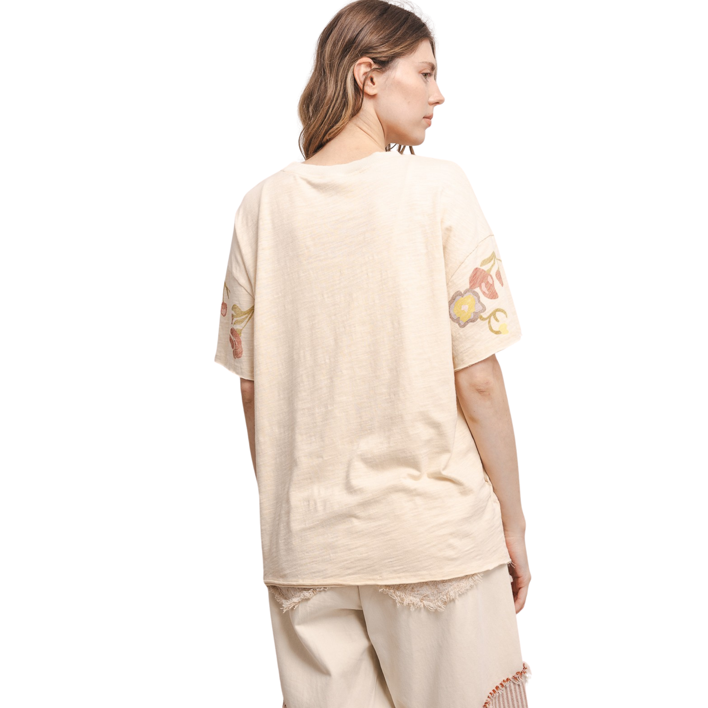 Embrace effortless style with this charming Butterfly In Garden Tee from Blue Velvet. Crafted in a warm tan hue, this short-sleeve tee features a delicate butterfly graphic that brings a touch of nature-inspired elegance to your everyday wardrobe. Perfect for casual outings, weekend adventures, or relaxed layering, this versatile piece pairs beautifully with jeans, shorts, or skirts. Soft, comfortable, and timeless—a wardrobe essential that celebrates natural beauty.