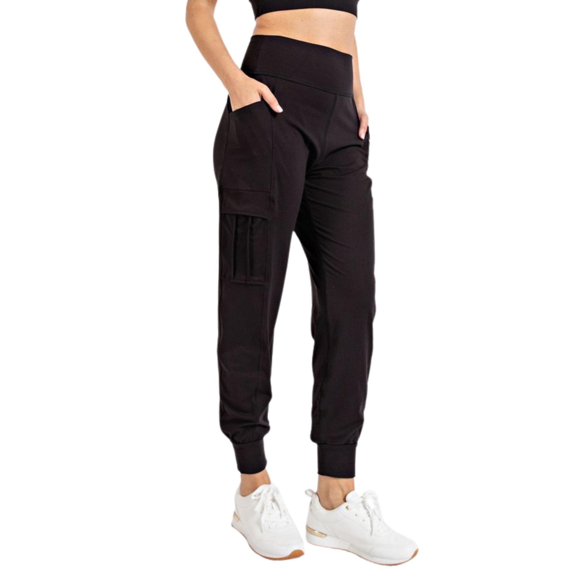 Effortlessly move and store your essentials with these Joggers. Made with our signature butter soft fabric and a waist band for ultimate comfort. Stay organized with side and cargo pockets, while the pintuck and bottom band add a touch of style. Available in black.