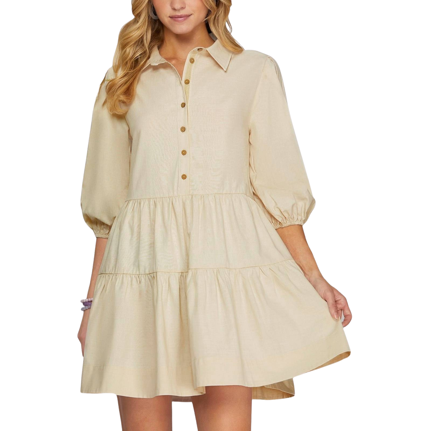 Elevate your everyday style with this charming collared button-down dress from She+Sky. Crafted in a soft ecru tone, this mini dress features a classic front button closure and flattering tiered silhouette that adds movement and dimension. Perfect for casual outings, weekend brunches, or layering with your favorite jacket. The structured collar and tailored buttons create a polished look that transitions effortlessly from day to night.