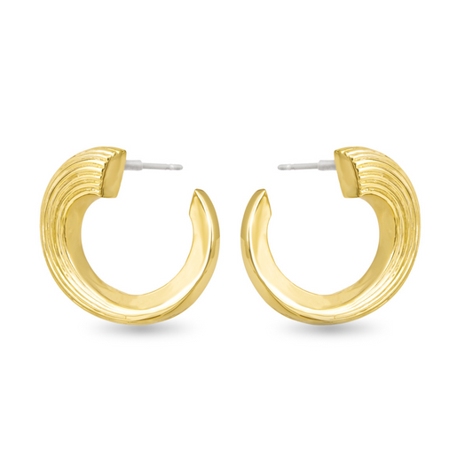 Expertly crafted by Amanda Blu, these Caroline Polished Twist Huggie Earrings feature a twisted ribbed design in gold. The small hoop style adds a touch of elegance to any outfit, making them a must-have accessory for any fashion-forward individual. Elevate your look with these timeless and sophisticated earrings.