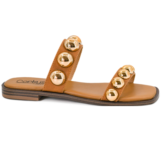 Catch a Buzz sandals deliver effortless style with their open-toe design and rich cognac hue. Crafted by Corkys, these flat sandals offer all-day comfort without sacrificing sophistication. The neutral cognac tone pairs seamlessly with warm-weather wardrobes, making them a versatile essential for casual outings and relaxed occasions. Experience the quality and thoughtful design Corkys is known for.