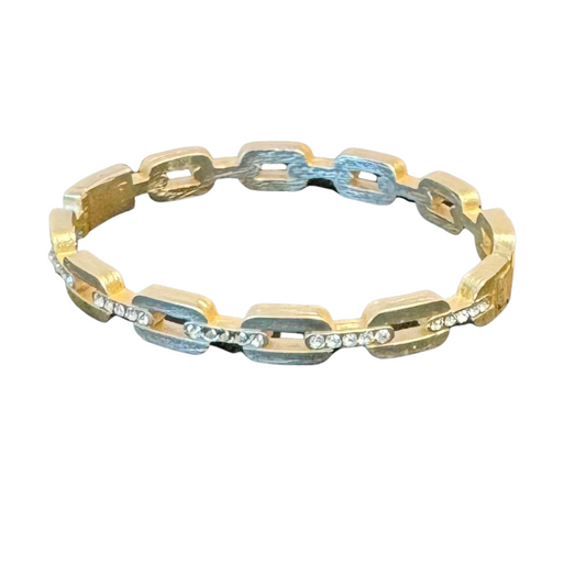 This Chain Link Rhinestone Cuff Bangle adds a touch of sparkle to your look. Made from gold with a chain link design and rhinestone accents, it's the perfect accessory to add a touch of glamour to your outfit.