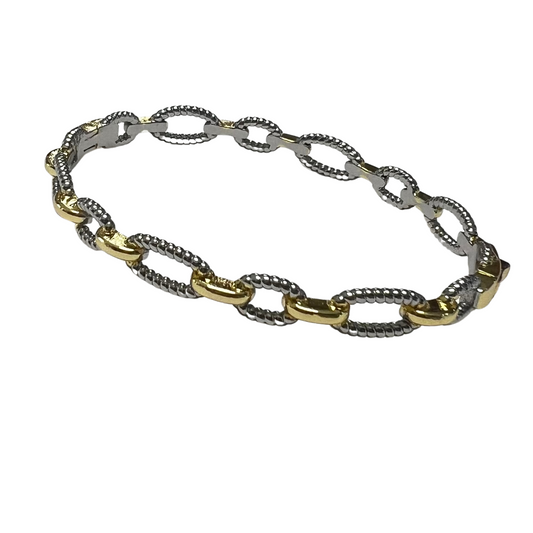 This elegant Chain Link Cuff Bangle is expertly crafted with a mix of silver and gold, creating a timeless and versatile piece. The unique chain link design adds a touch of sophistication, making it perfect for any occasion. Elevate your style with this must-have bangle cuff.