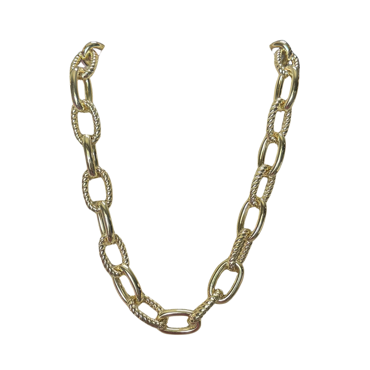 Elevate your everyday style with this stunning Chain Link Necklace from Perdido Gems. Crafted in lustrous gold, this short necklace features a bold chain link design that strikes the perfect balance between classic and contemporary. The interlocking links create a dynamic, textured look that catches the light beautifully, making it an ideal piece for layering or wearing solo. Perfect for adding a touch of sophistication to any outfit, this versatile necklace transitions seamlessly from day to night. 