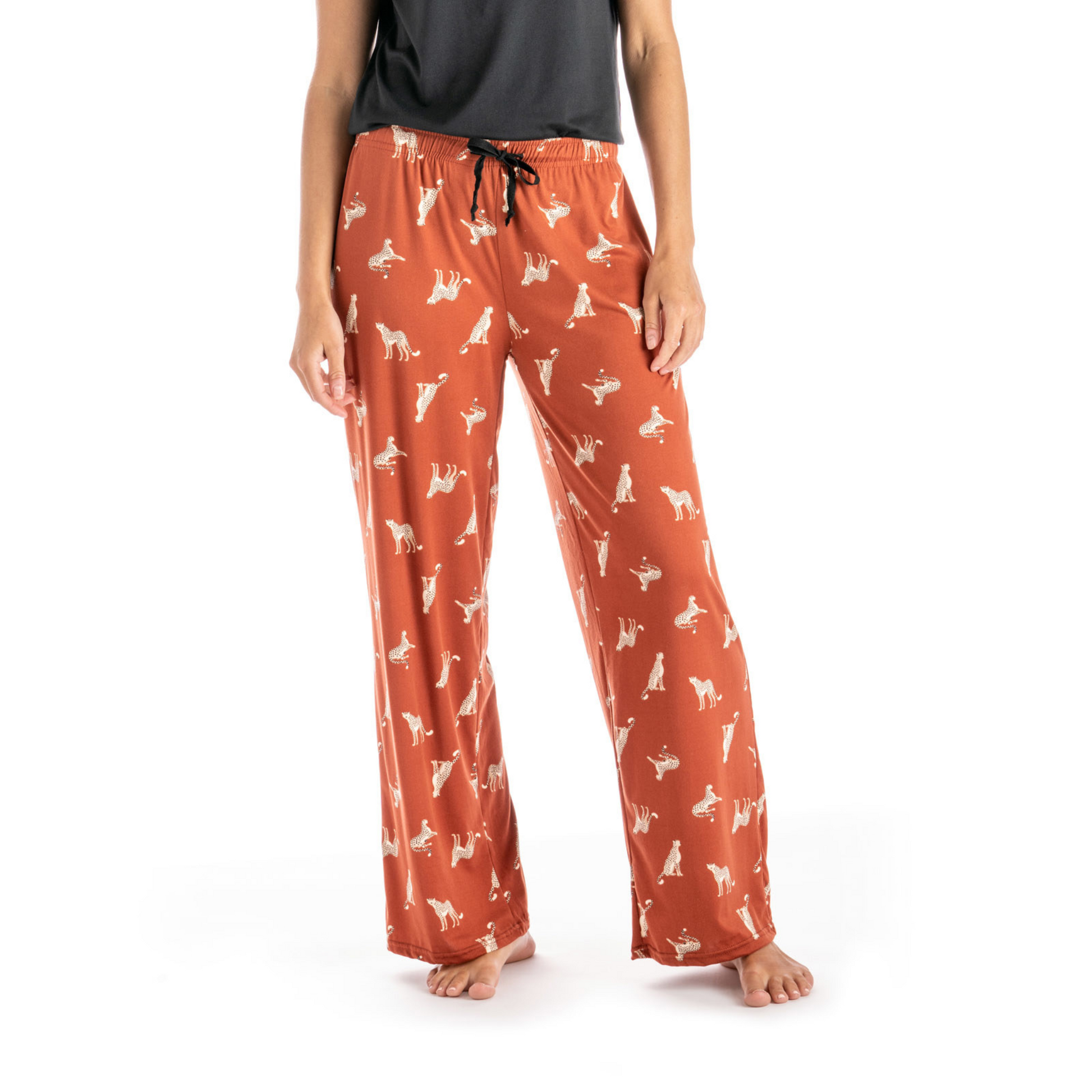 super soft orange loungewear pants with cheetah graphics and drawstring
