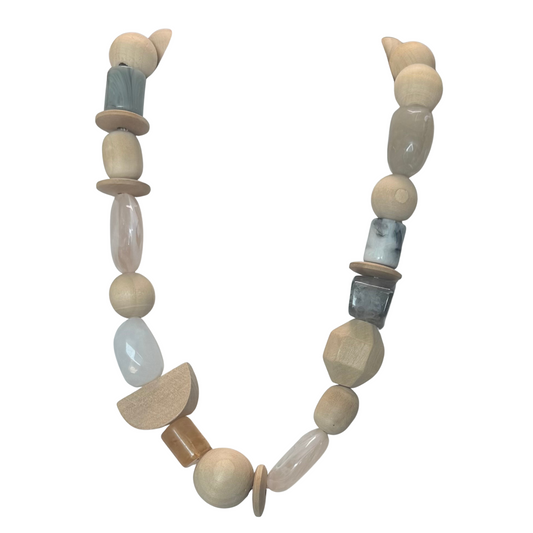 Crafted with natural-colored wooden beads, this Chunky Beaded Necklace from Golden Stella offers a refined simplicity perfect for everyday elegance. Its short length ensures it sits comfortably around the neck, making it an ideal accessory to enhance both casual and professional looks with understated, organic charm.