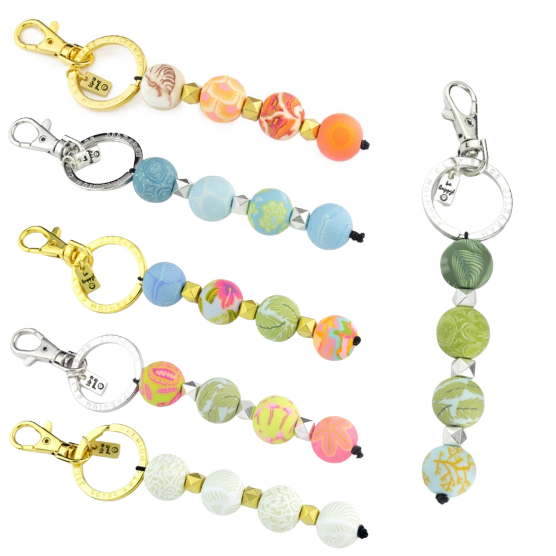 Handmade with bright colors, this Clay Bead Keychain adds a unique touch to any set of keys. Crafted with care, each clay bead is carefully shaped and hand-painted, making every keychain one-of-a-kind. A colorful and eye-catching addition to your everyday essentials.
