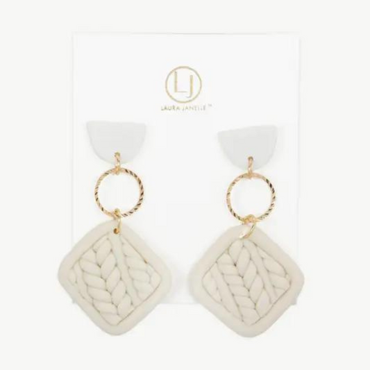 These elegant Dangle Square Earrings feature a white clay design with a gold accent, adding a touch of sophistication to any outfit. The dangling style frames your face, adding a flattering and eye-catching element to your look. Elevate your style with these versatile and modern earrings.