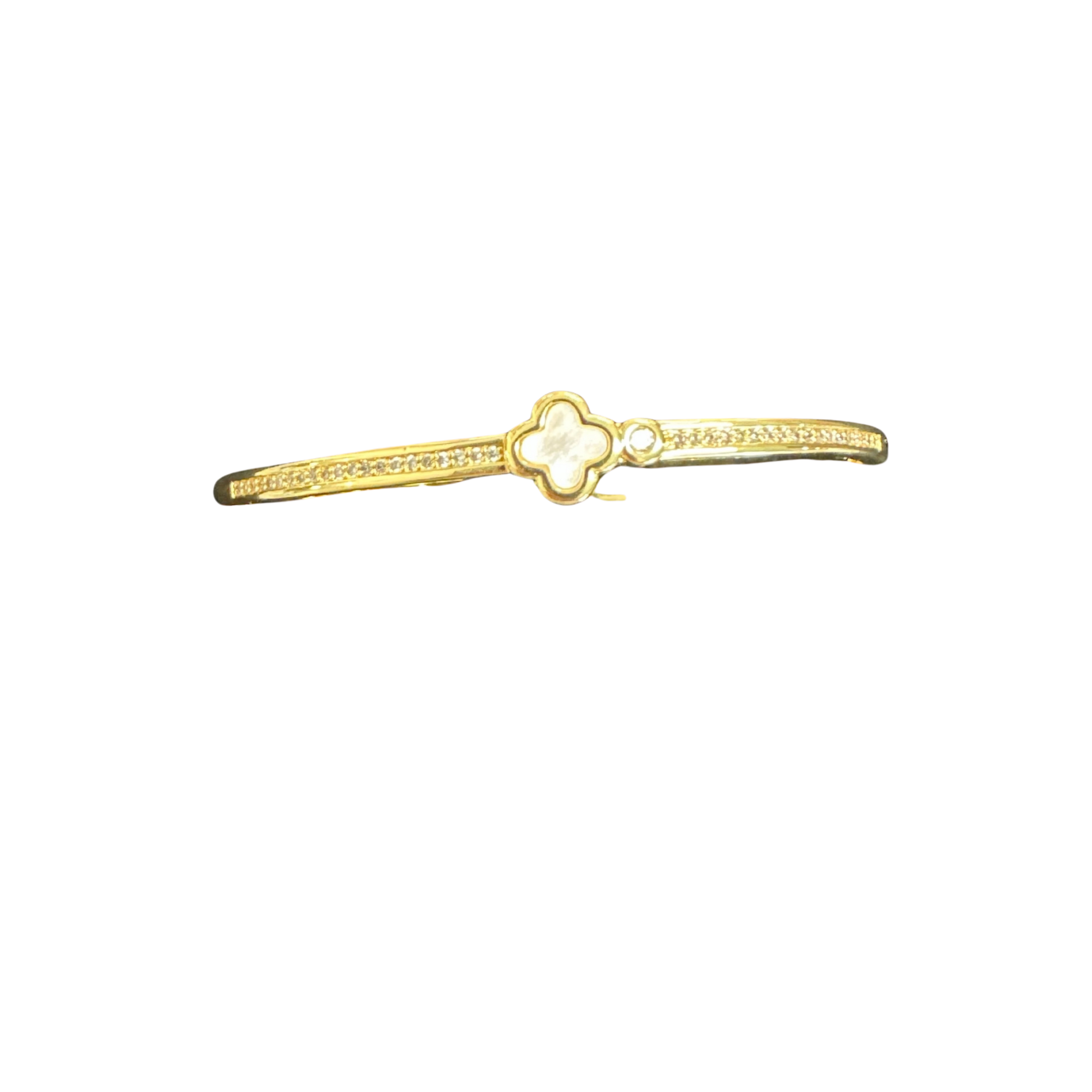 Elevate your wrist with this exquisite Clover Bangle Bracelet by Perdido Gems. Crafted in lustrous gold, this timeless piece features a delicate clover design adorned with shimmering rhinestone accents that catch the light beautifully. The bangle's smooth, polished finish and secure fit make it an ideal choice for both everyday wear and special occasions. A sophisticated accessory that seamlessly complements any wardrobe while adding a touch of refined elegance to your personal style.