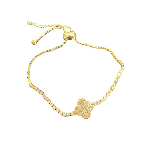 This stunning Rhinestone Clover Tennis Bracelet features a delicate clover design in shimmering gold. The adjustable design allows for a perfect fit, making it a versatile and stylish addition to any outfit. With its sparkling rhinestones, this bracelet adds a touch of elegance and sophistication to your look.