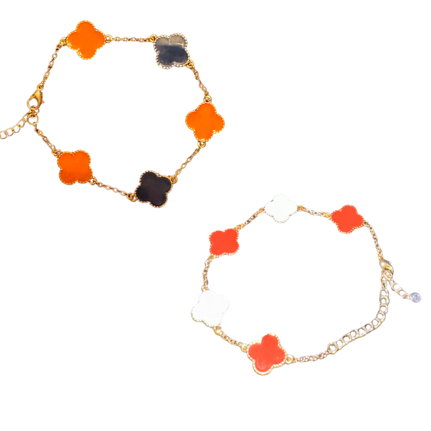 The Collegiate Clover Bracelet features a beautiful clover design, available in crimson and white or orange and blue. With an adjustable clasp, this tennis bracelet is perfect for any wrist size. Made with gold, this bracelet adds a touch of elegance to any outfit. Show your school spirit with this stylish accessory.