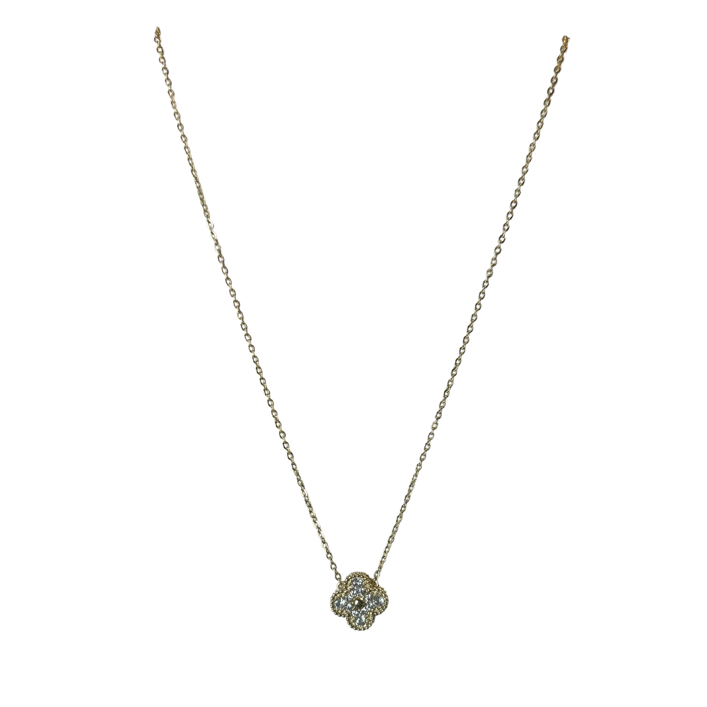 This elegant necklace features a sparkly clover pendant, perfect for adding a touch of glamour to any outfit. The short length provides a delicate and stylish look, while the gold finish adds a touch of sophistication. A must-have for any jewelry collection.