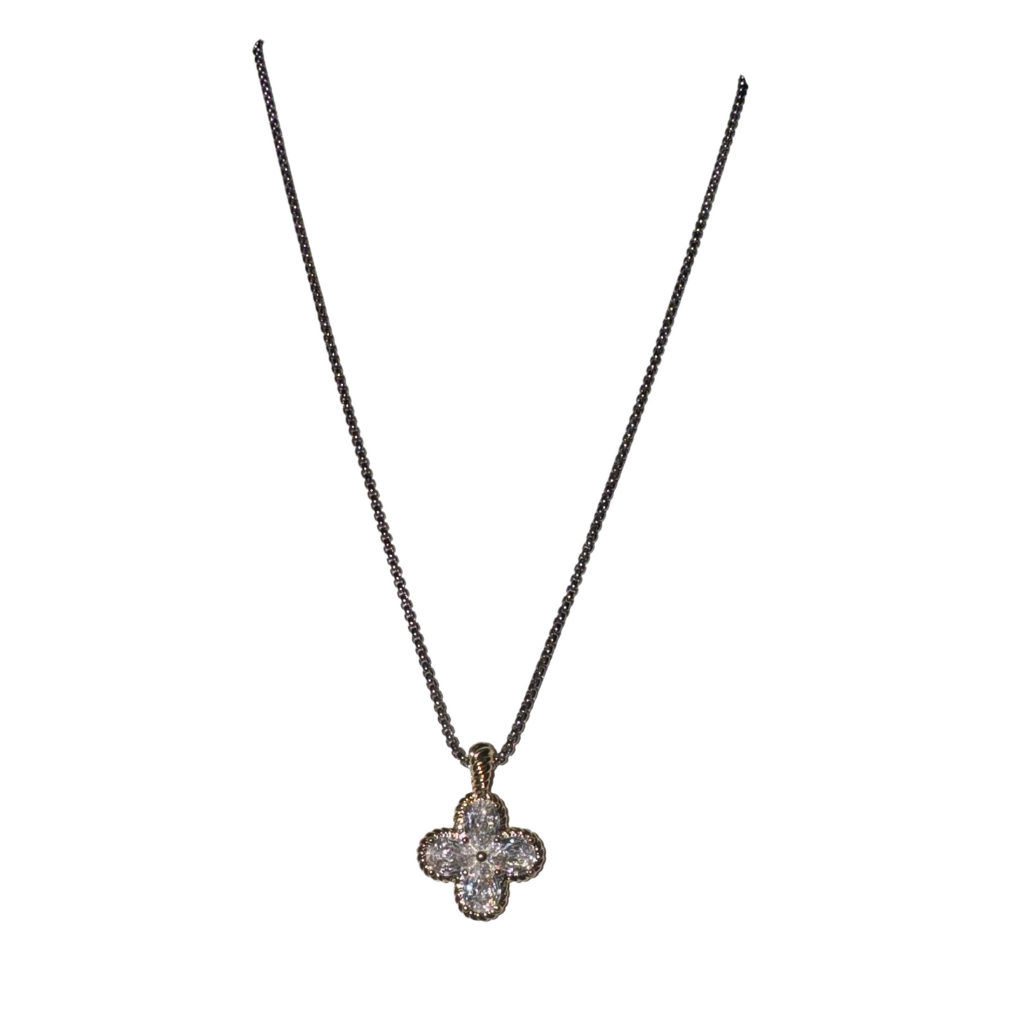 This expertly crafted Clover Necklace features a unique design with rhinestone accents and a combination of silver and gold elements. Its long length adds a touch of elegance to any outfit. Perfect for adding a sophisticated touch to your style.