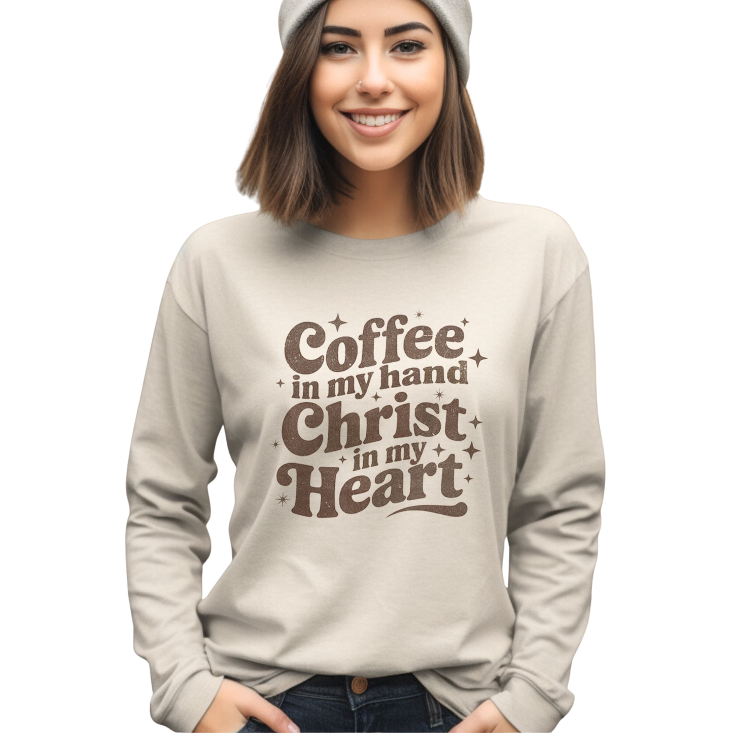 Elevate your everyday wardrobe with this meaningful graphic tee from Carmelo. Featuring a bold "Coffee in my hand, Christ in my heart" design, this long-sleeve shirt combines comfort with purposeful style. The sand color offers versatile pairing options for casual wear, while the quality construction ensures durability through regular wear. Perfect for those seeking apparel that reflects their values and faith.
