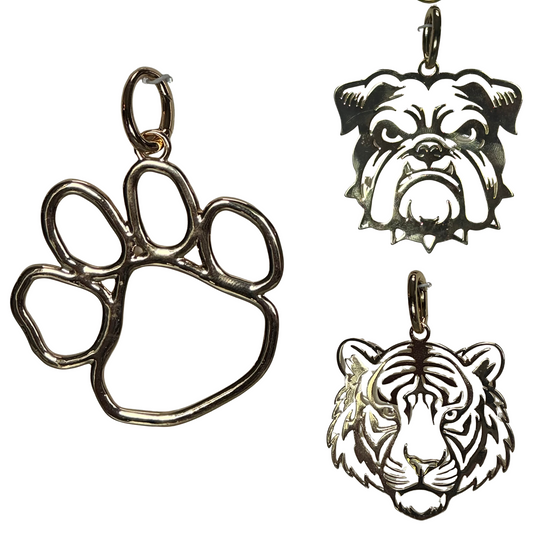 Celebrate your school pride with the Collegiate Scarf Necklace Charms by Golden Stella. Available in a variety of styles, these large gold charms are designed to add a bold, elegant touch to your accessories. Perfect for showcasing your school spirit with sophistication, each charm offers a distinctive shimmer that complements scarves and necklaces alike. Crafted to stand out, these pieces make meaningful gifts or personal statements for dedicated fans and alumni.