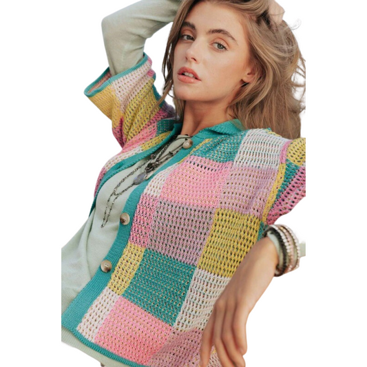 This Block Textured Knit Sweater stands out with a multi-colored, checker-textured knit design. Crafted with a button front closure, it offers the ideal blend of style, comfort, and practicality. The lightweight material is perfect for both casual and formal occasions.