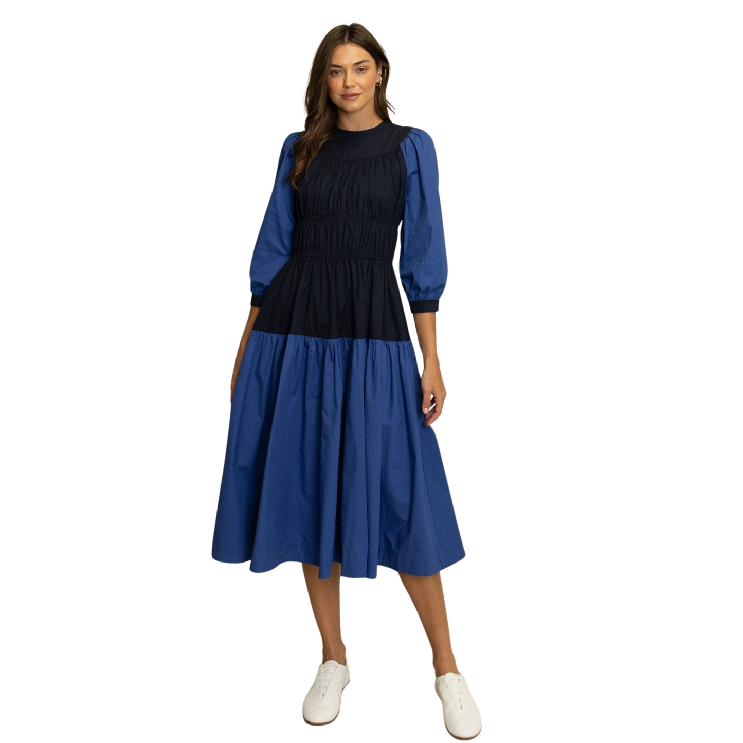 Elevate your wardrobe with this sophisticated HEYSON tiered midi dress, featuring a striking blue and navy colorblock design that creates visual interest and dimension. The three-quarter length sleeves offer versatile coverage, making it ideal for transitional seasons and layering opportunities. The midi silhouette provides a polished, elongating effect while maintaining comfort and ease of movement. Perfect for both professional settings and elevated casual occasions, this piece combines contemporary color