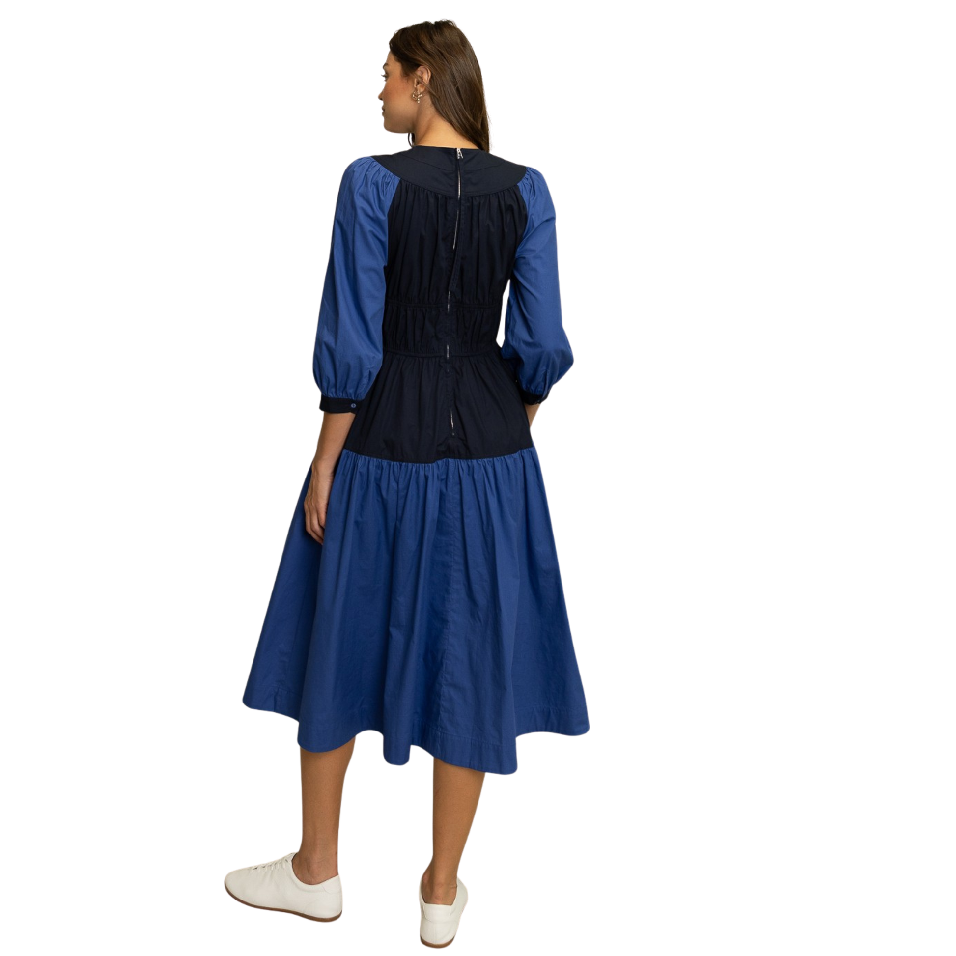 Elevate your wardrobe with this sophisticated HEYSON tiered midi dress, featuring a striking blue and navy colorblock design that creates visual interest and dimension. The three-quarter length sleeves offer versatile coverage, making it ideal for transitional seasons and layering opportunities. The midi silhouette provides a polished, elongating effect while maintaining comfort and ease of movement. Perfect for both professional settings and elevated casual occasions, this piece combines contemporary color