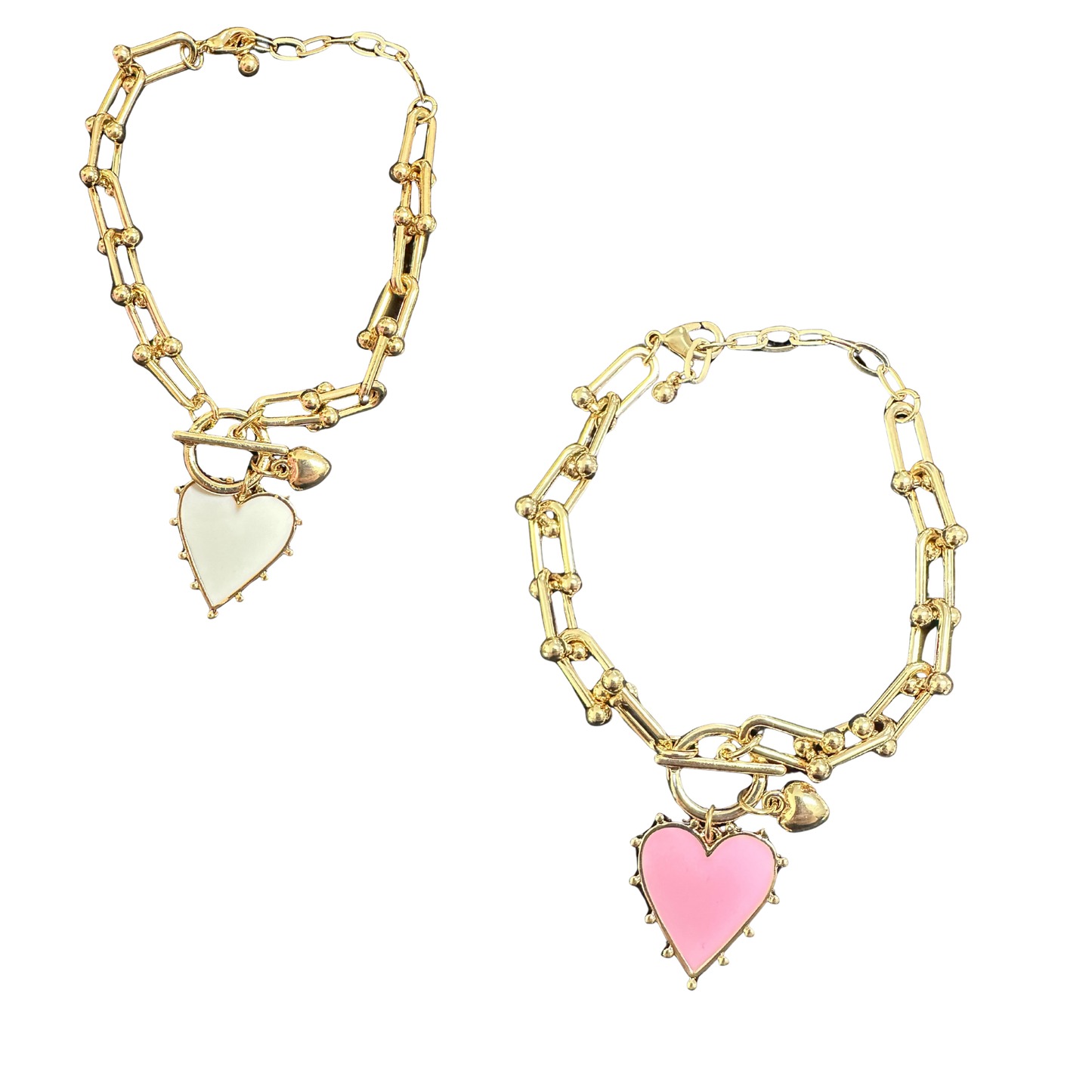 Elevate your everyday elegance with this charming heart bracelet from Perdido Gems. Featuring a delicate chain link design, this piece combines timeless sophistication with modern appeal. The heart pendant serves as a meaningful focal point, while the refined construction ensures lasting wear. Available in soft pink or classic white, it adapts effortlessly to any style preference. Perfect for layering or wearing solo, this bracelet makes a subtle yet impactful statement for those who appreciate quality craf