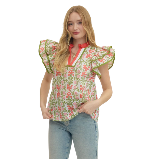 Elevate your wardrobe with this stunning Floral Print Flutter Sleeve Top by Entro. Featuring a flattering V-neckline and classic collar, this piece combines timeless style with modern charm. The delicate flutter sleeves add graceful movement, while the vibrant coral base showcases a beautiful floral print that brings life to any outfit. Perfect for casual days or dressed-up occasions, this versatile top pairs effortlessly with your favorite bottoms for a polished, put-together look.
