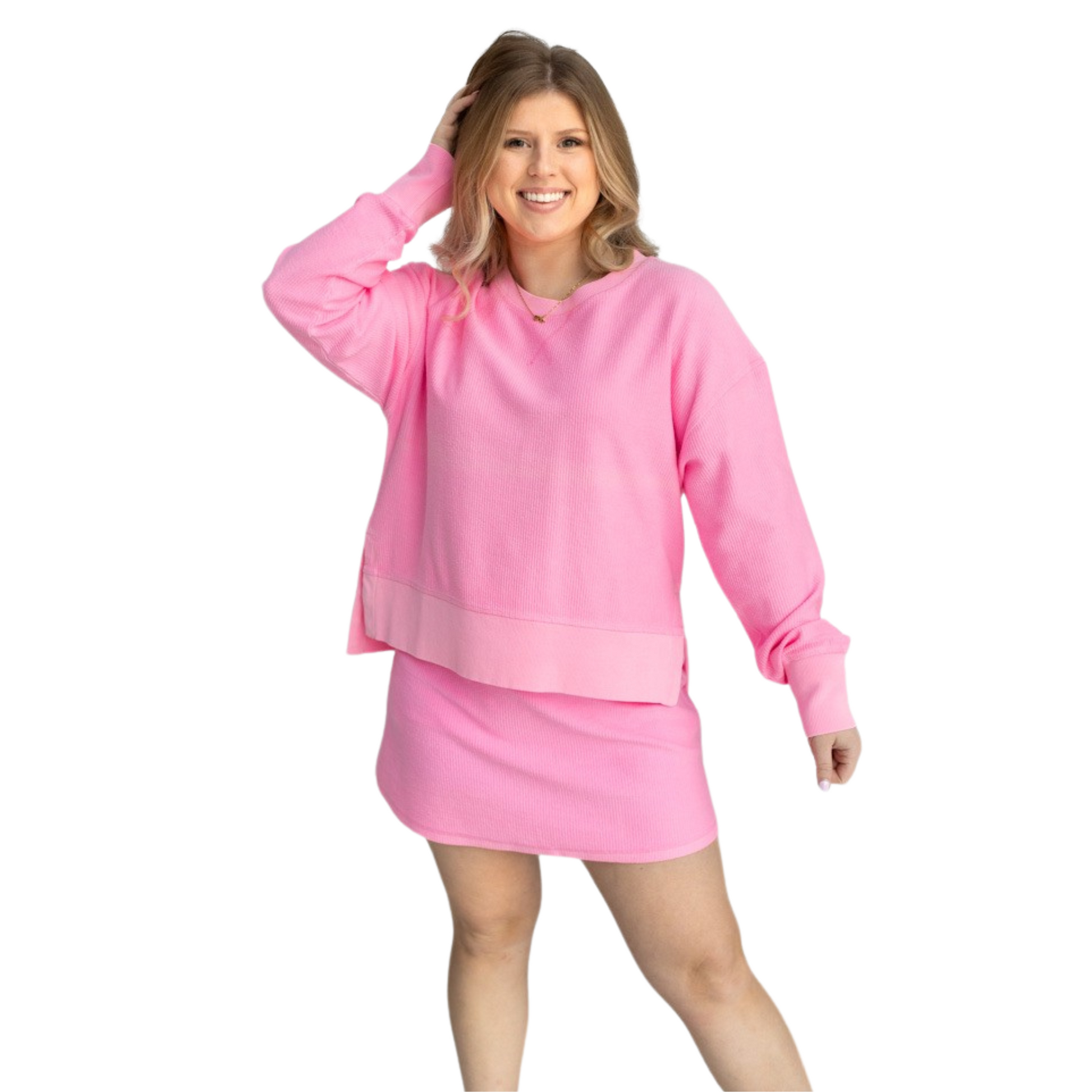 Add a pop of color to your workout wardrobe with our Corded Crew and Skort Set! The vibrant pink hue will energize your routine, while the cozy crew neck sweatshirt ensures comfort. The corded skort adds a touch of style and versatility. Trust in the quality of Moon Ryder brand for your active wear needs.