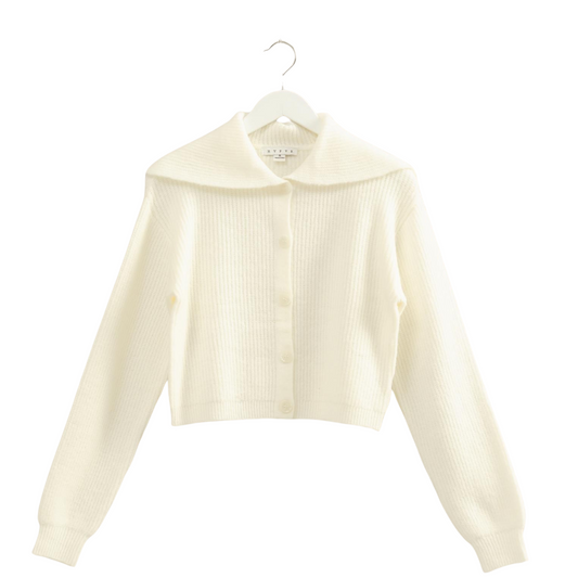Elevate your wardrobe with the Sailor Collar Cardigan by HYFVE, crafted in a soft cream knit. This button-up design combines timeless style with cozy comfort, making it an essential layering piece for cooler days. The classic sailor collar adds a refined, expert touch, while the quality knit fabric ensures durability and warmth throughout the season. Perfect for both casual and polished looks, this cardigan merges sophistication with everyday practicality.