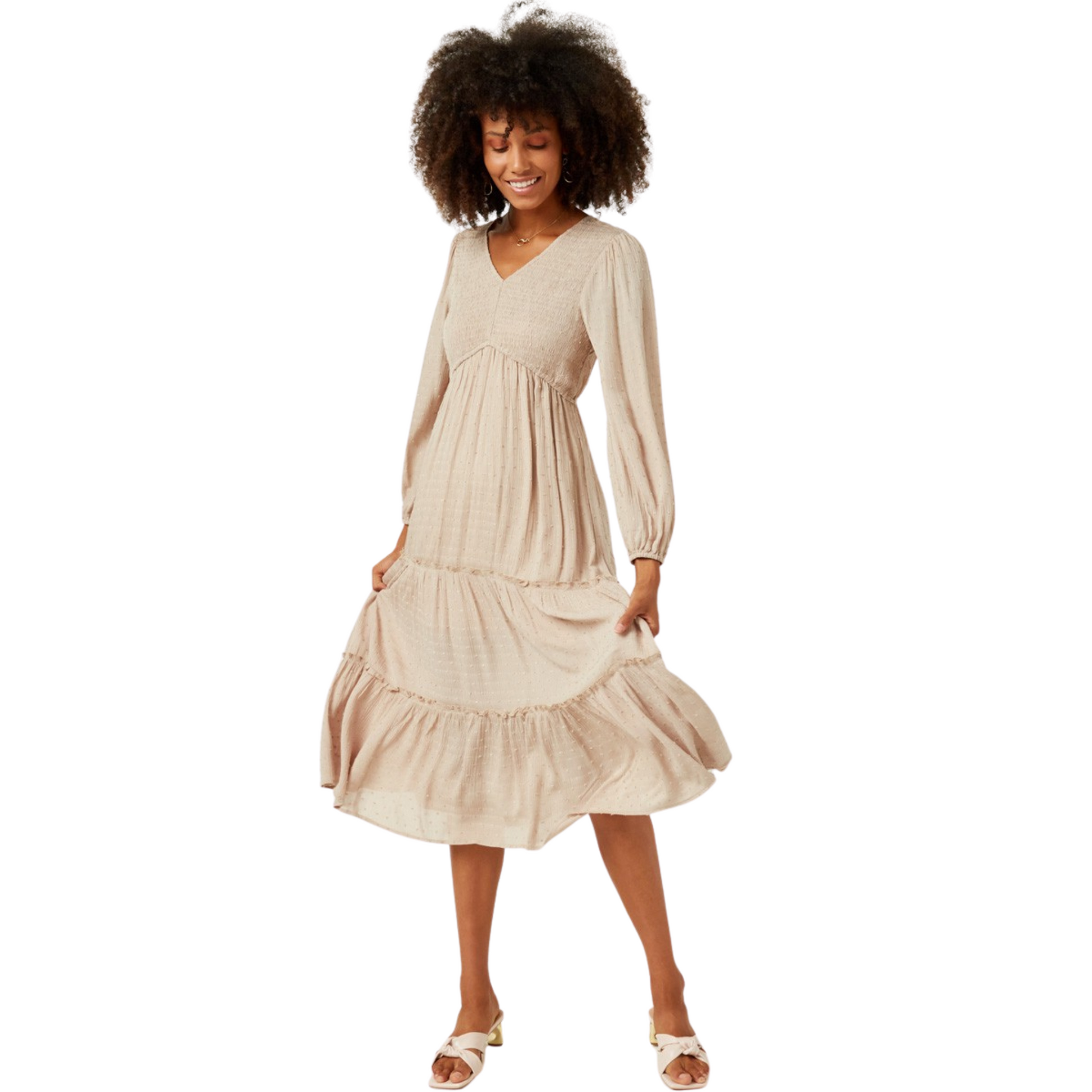 This fashion-forward Swiss dot tiered dress is perfect for any occasion. Made of lightweight woven fabric, this cream-colored maxi dress features a flattering v-neckline, back keyhole closure, and a dress lining for added comfort. Enjoy a feminine and timeless look!