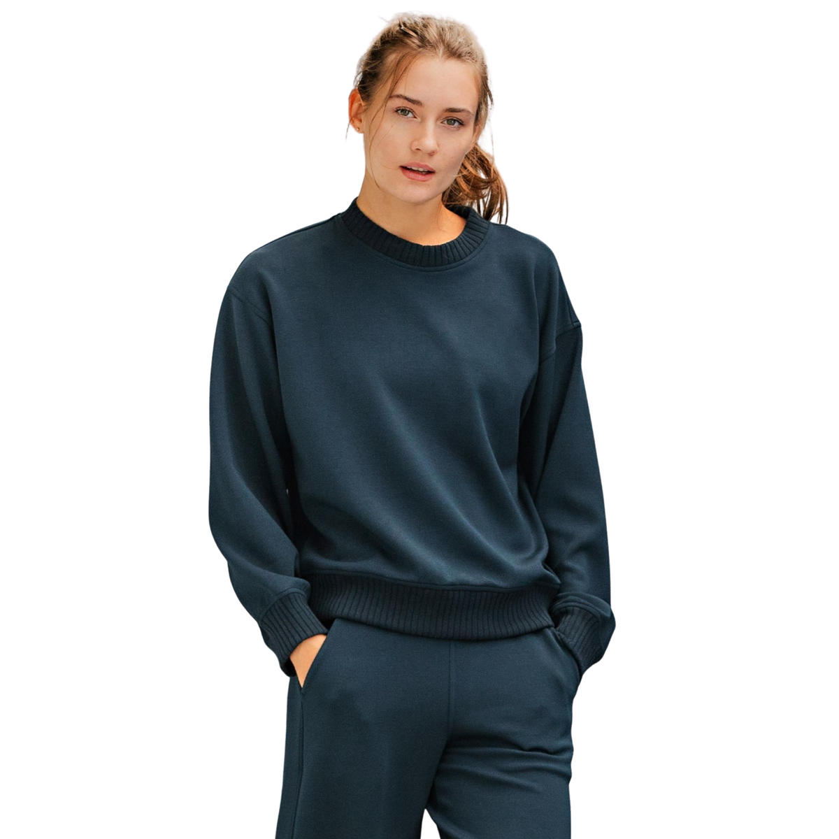 Effortless elegance meets everyday comfort in this Rae Mode Luxe Crew Neck Top. Crafted in a rich navy hue, the long sleeves and timeless crew neckline create a versatile piece perfect for layering or wearing solo. The soft fabric drapes beautifully, making it an essential addition to any wardrobe. Whether you're dressing up or down, this top transitions seamlessly from day to night.