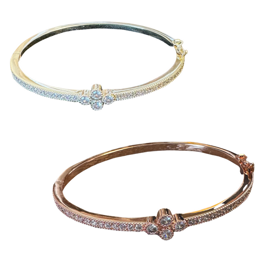 This Rhinestone Cuff Bangle will make a sophisticated addition to any wardrobe. This stylish accessory is crafted from bronze with a rhinestone embellishment, creating a fashionable and timeless look.