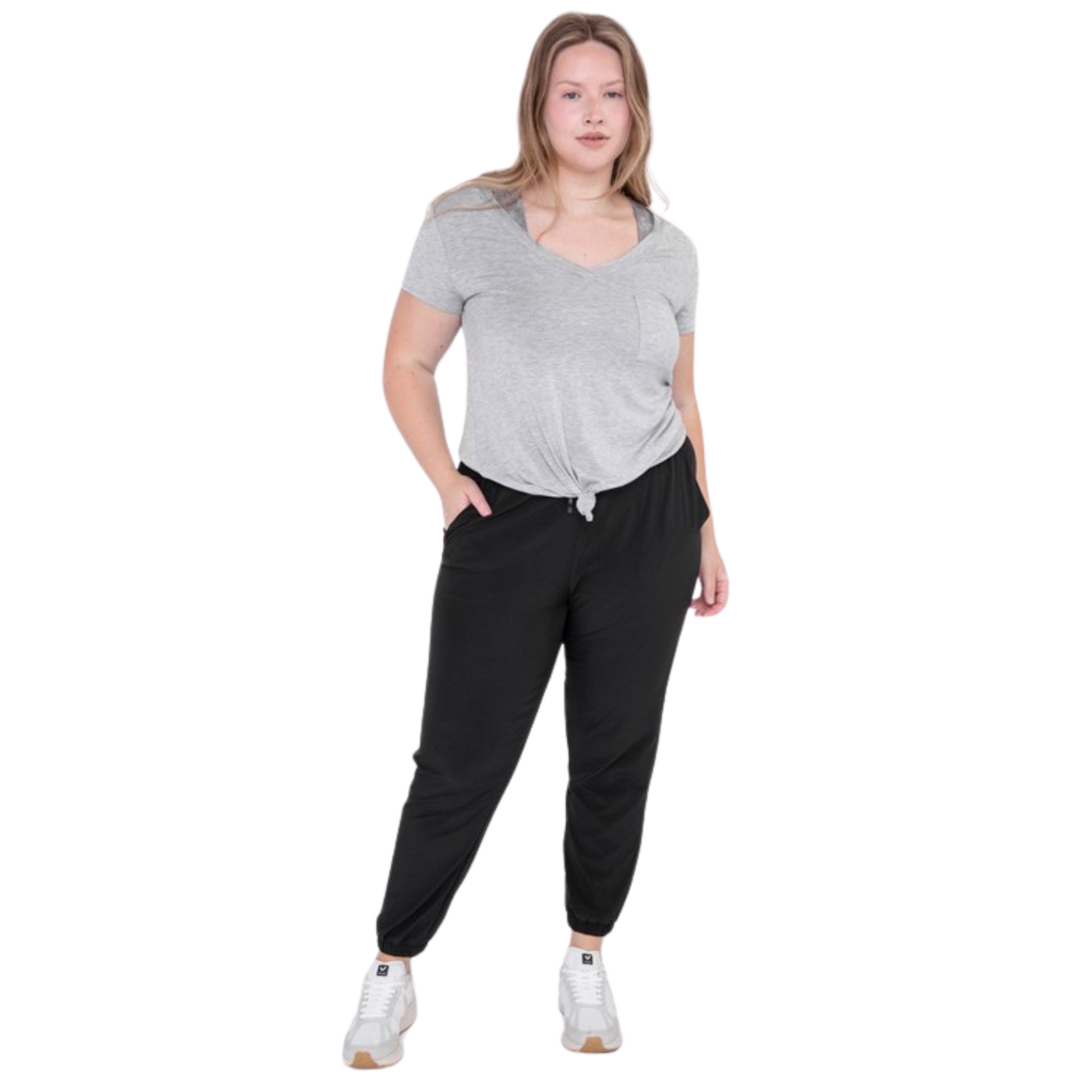 Be ready for your next adventure with these Curvy High Waisted Joggers. Crafted from premium fabric, they feature a high and elasticized waistband with drawstring closure, slanted pockets, and 7/8 length with cuffed ankles for a stylish look. Available in classic black color.