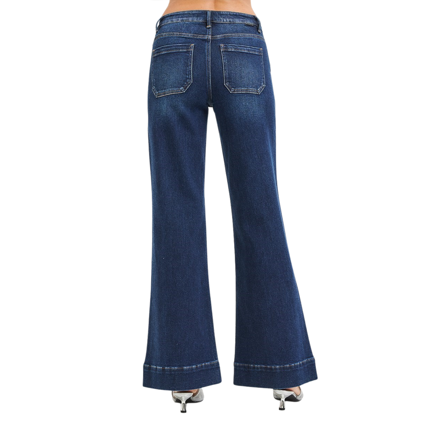 Elevate your denim game with these High Rise Flared Jeans from Risen. Crafted in a flattering dark wash, these wide-leg beauties feature built-in tummy control to smooth and shape your silhouette. The high-rise cut elongates your legs while the stretchy fabric moves with you all day. A timeless style that works for any occasion.