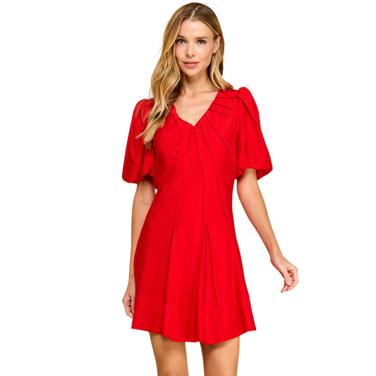 Enhance your style with our Front Decorative Seams Detail Dress. This stunning dress features a V-neckline and puff sleeves, making it both flattering and trendy. The front decorative seams add unique detail and the concealed back zipper offers a seamless finish. Made in a bold red color, this dress is perfect for any occasion.