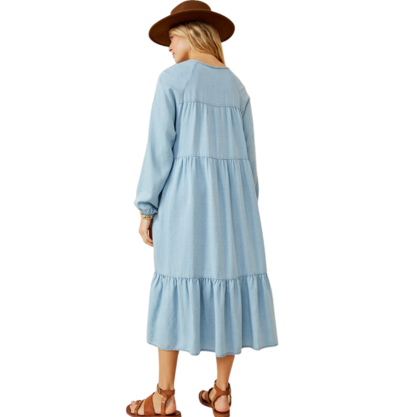 This Long Sleeve Tencel Dress offers contemporary style with a timeless denim fabrication. The womens smock detail ties at the neck and provides a sophisticated silhouette, while side pockets complete the design. Crafted from 100% Tencel, this dark denim dress is the perfect balance of modern and classic.