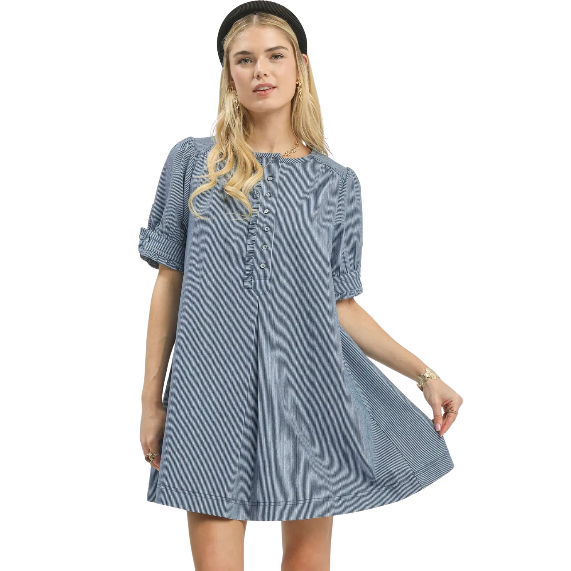 Update your casual wardrobe with this charming denim mini dress by Umgee. Featuring a flattering front button accent and short sleeves, this versatile piece transitions effortlessly from day to night. The classic denim construction offers durability and timeless style, while the mini length keeps things fresh and modern. Perfect for pairing with sneakers, boots, or sandals, this dress is an essential addition to any fashion-forward closet.