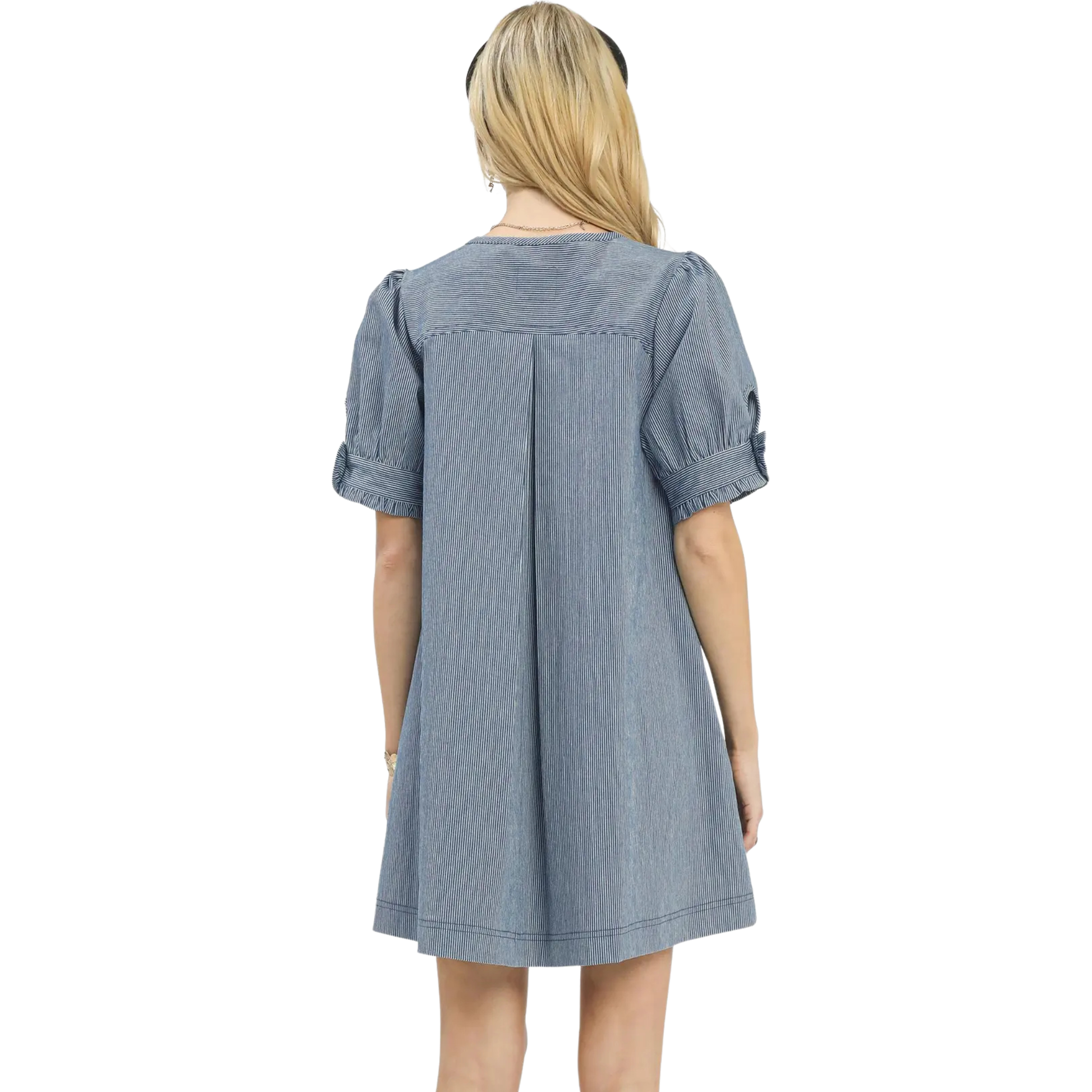 Update your casual wardrobe with this charming denim mini dress by Umgee. Featuring a flattering front button accent and short sleeves, this versatile piece transitions effortlessly from day to night. The classic denim construction offers durability and timeless style, while the mini length keeps things fresh and modern. Perfect for pairing with sneakers, boots, or sandals, this dress is an essential addition to any fashion-forward closet.