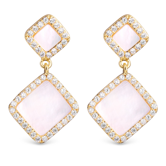 These elegant Diamond Shaped Drop Earrings feature a diamond design with sparkling rhinestone accents. The dangle style creates a graceful and feminine look, while the mother of pearl adds a touch of sophistication. Crafted in gold, these earrings are perfect for adding a touch of glamour to any outfit.